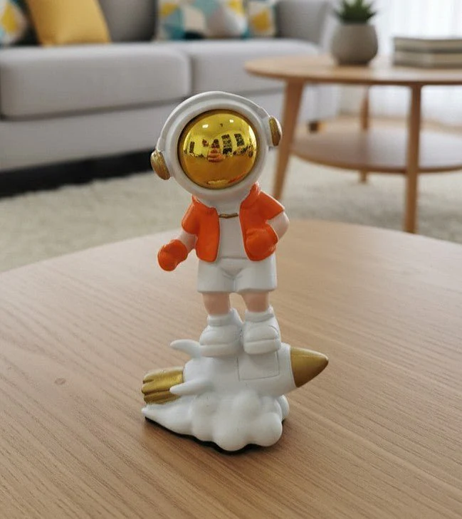 AKDC Mini Ceramic Astronaut Balancing on White & Orange Spaceship Figurine – Creative Space Décor 7.5 cm - Image 2