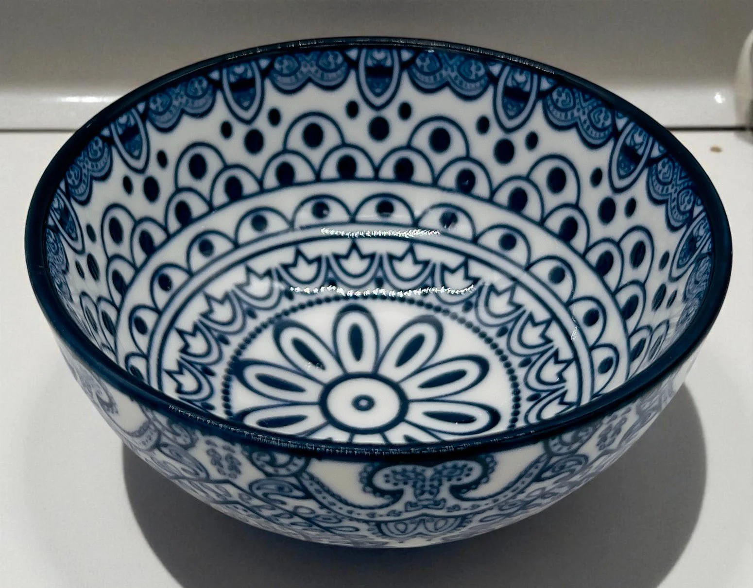 Che Brucia Ceramic Round Bowl 4", Blue Floral Pattern
